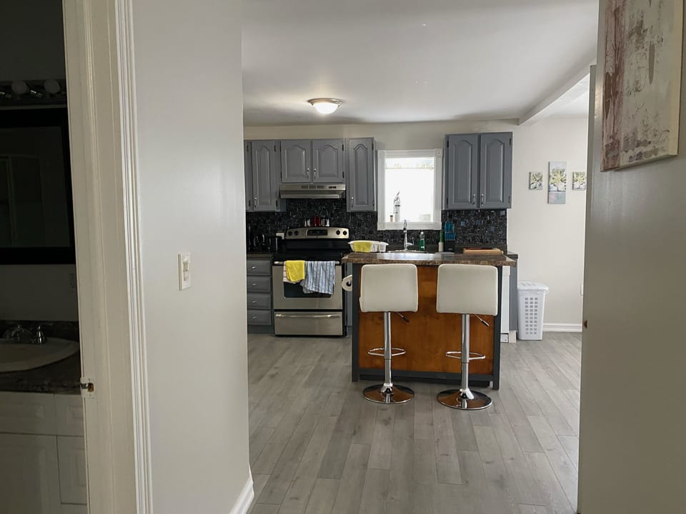 View of kitchen with island and island seating