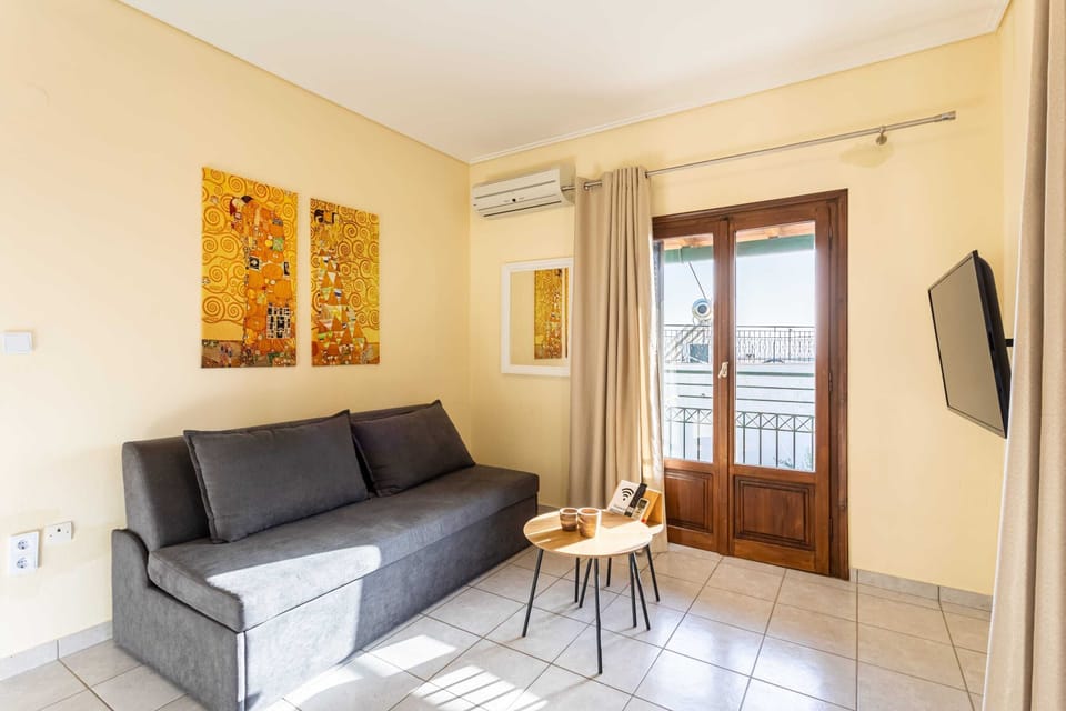 Air-Conditioned for Optimal Comfort – Modern living room with a relaxing atmosphere.