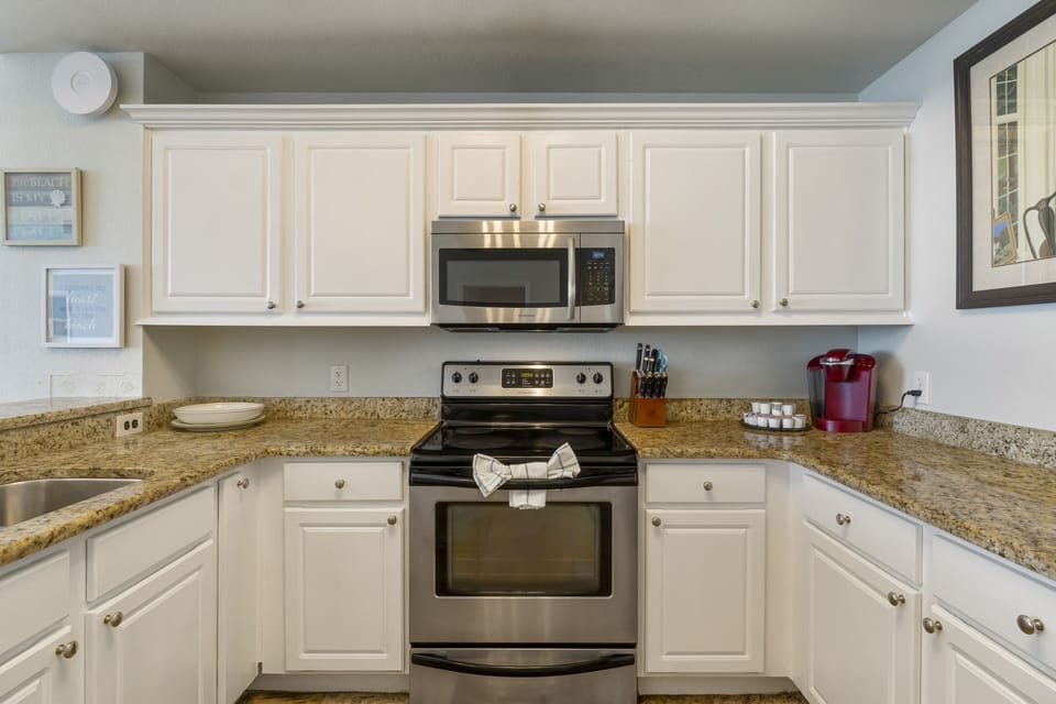 A fully-loaded stainless steel kitchen with everything you need for a nice meal.