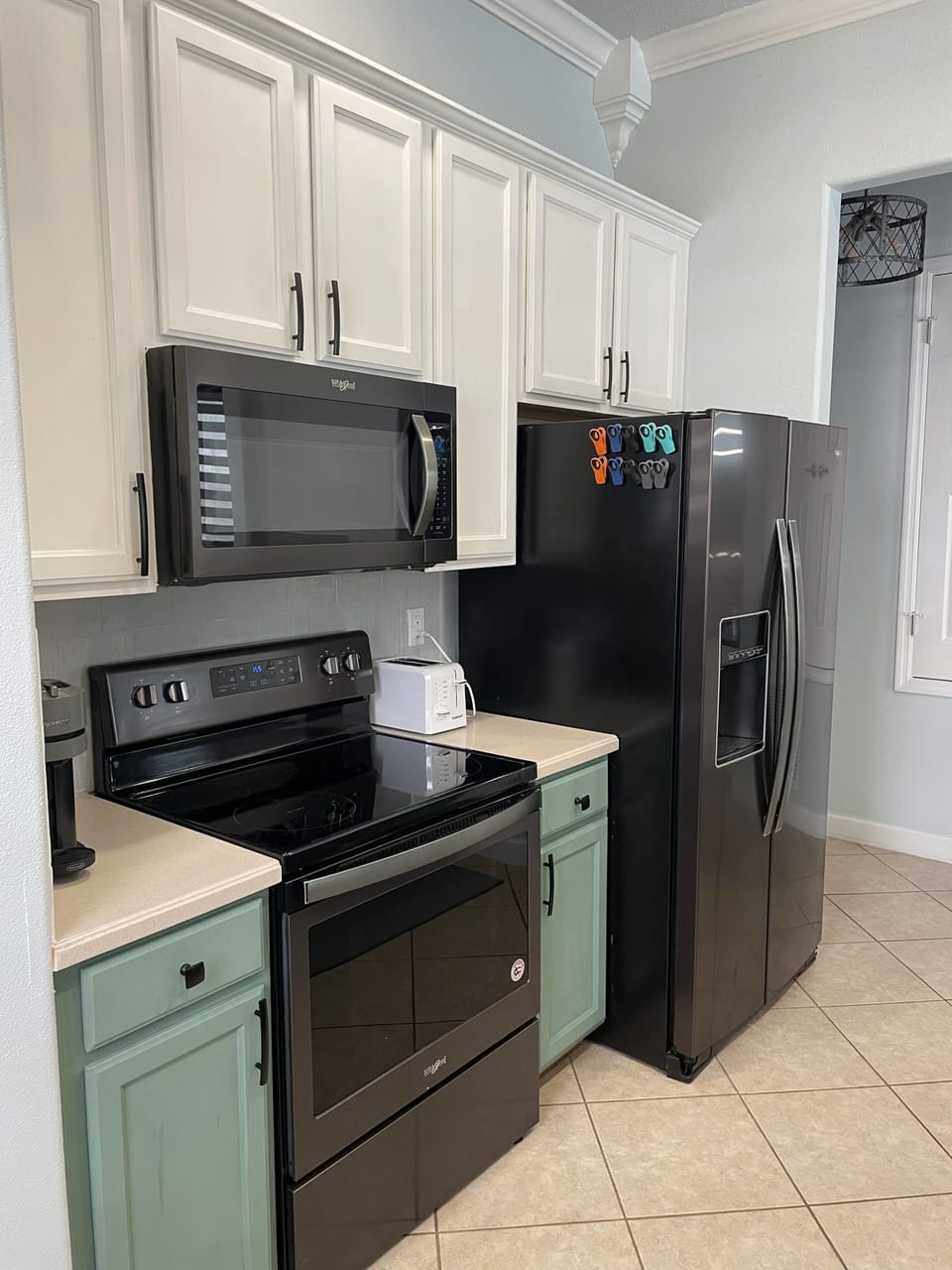 Fully stocked kitchen open to living and dining space.
