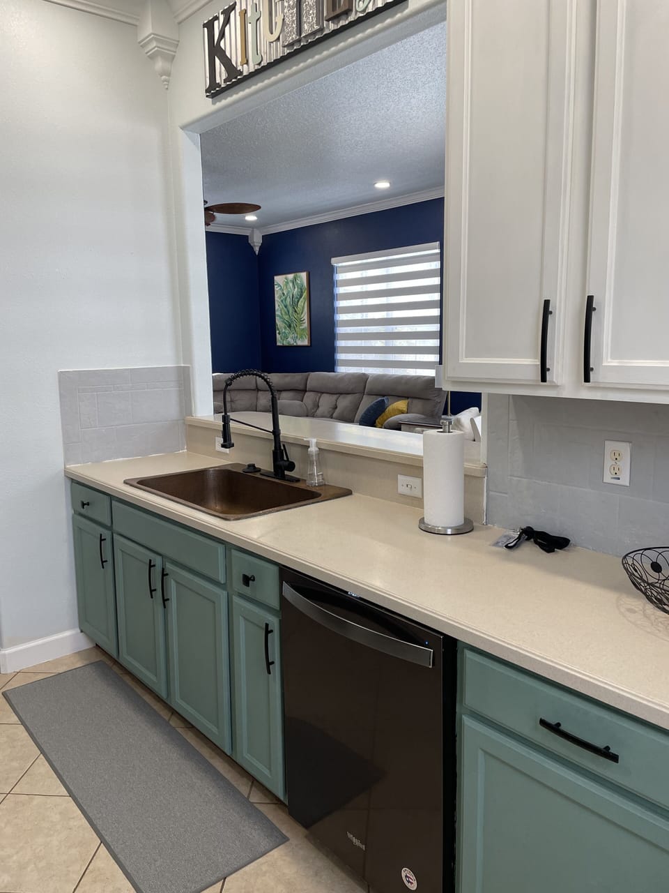 Fully stocked kitchen open to living and dining space.