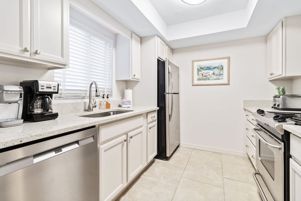 Kitchen has Mr. Coffee machine and single cup Keurig  coffee maker