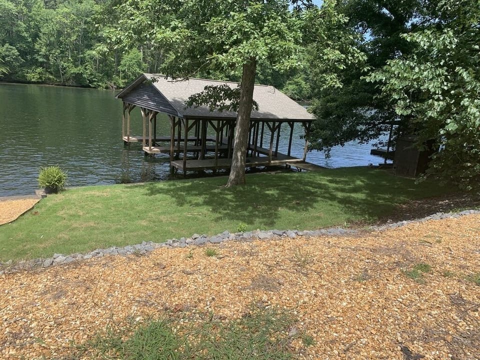 Dock and large fenced back yard