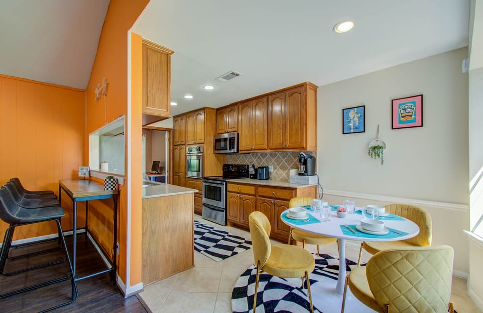 Open concept area with the main living room, kitchen, and mini mini dining area