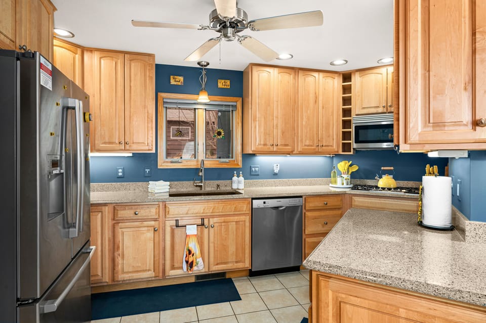 The kitchen is fully stocked with all you need to cook and dine.