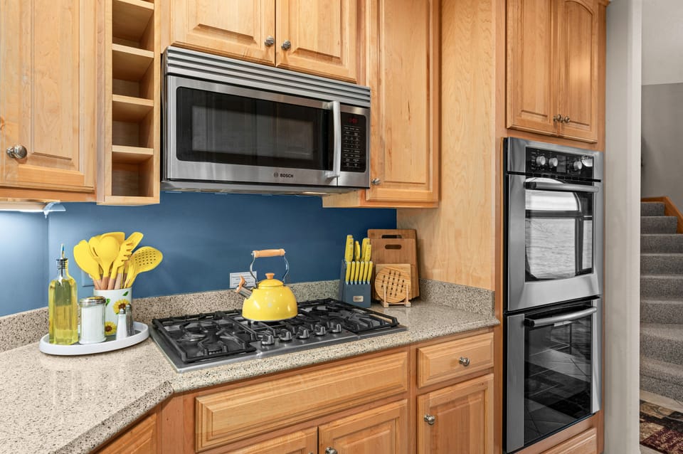 Tea kettle, quality knives, utensils, cooking oil, sugar, salt and pepper are all available to make meal prep a breeze.