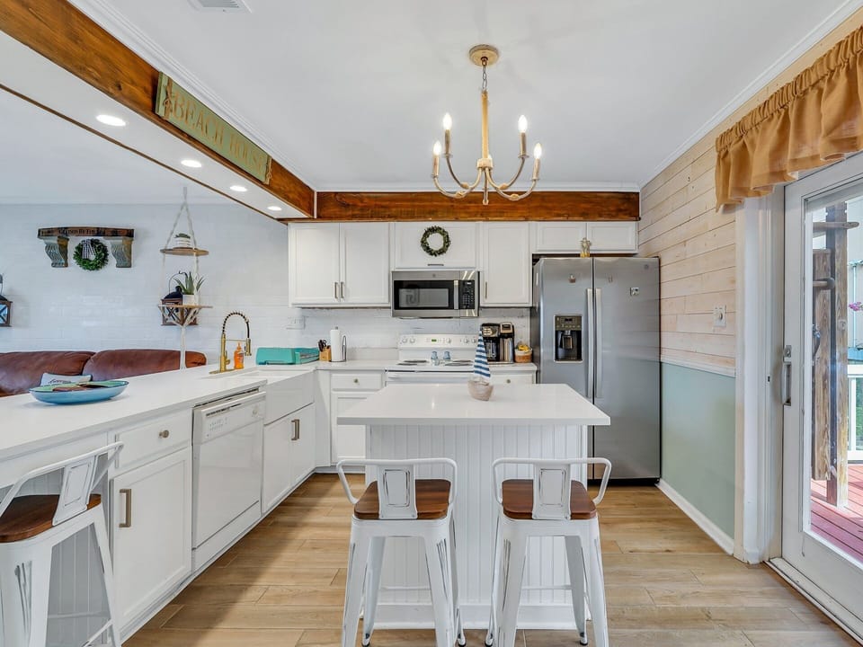 The kitchen is fully equipped with everything needed to make a great meal at home.