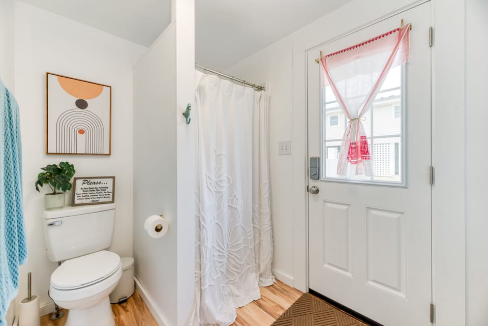 King Suite Bathroom - With backyard access and laundry this bathroom is well thought out and fully functional.
