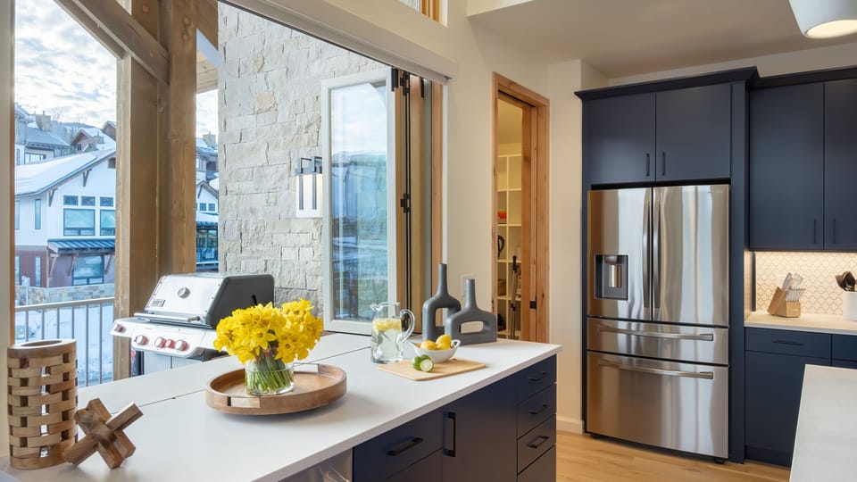 Kitchen, Upper Level - Countertop with access to deck