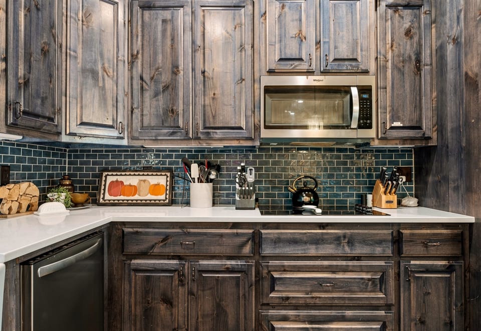 The large kitchen island provides plenty of space for cooking or gathering around with friends and family.