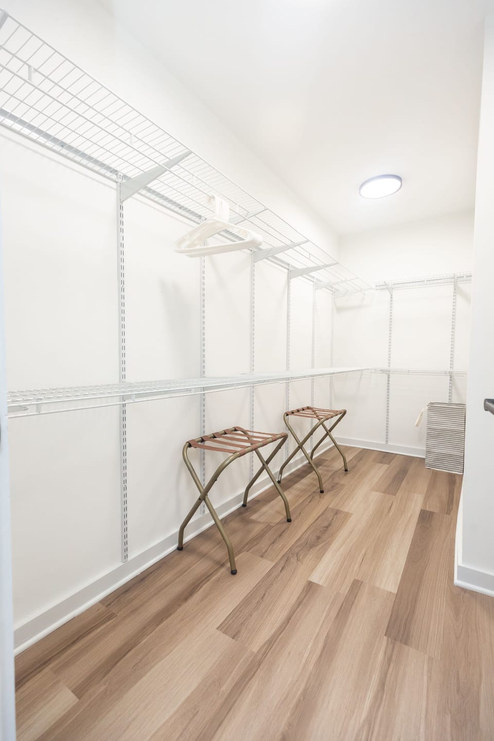 Spacious walk-in closet with ample storage for a comfortable stay