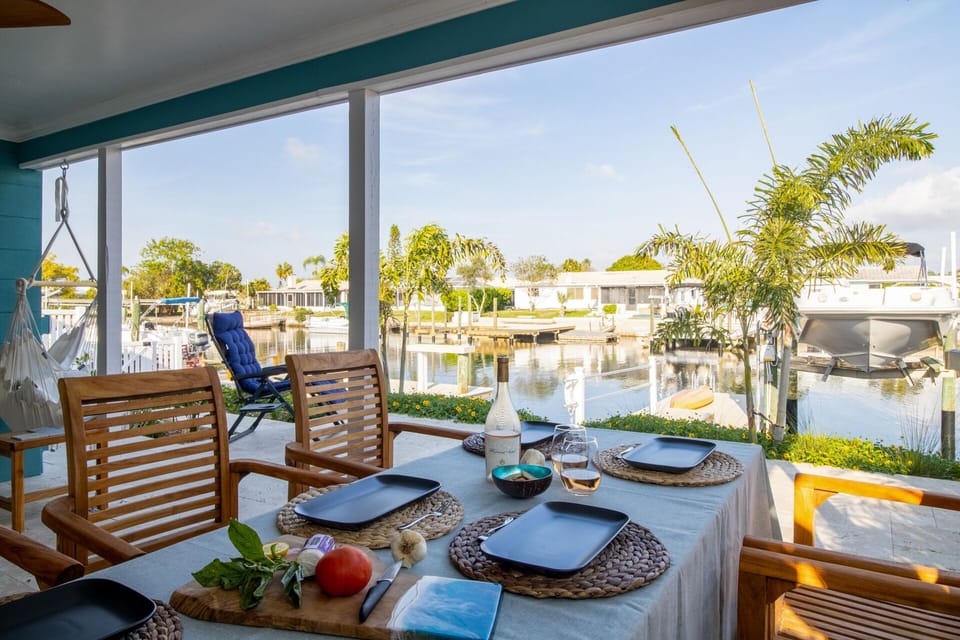 Outdoor dining area with canal view