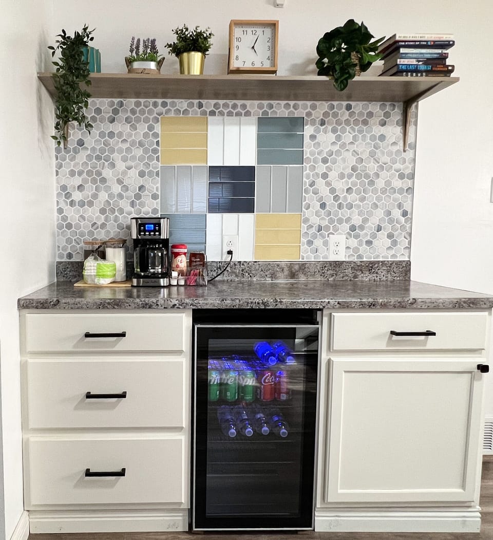 Coffee station and cooler to enjoy your favorite drinks. 
