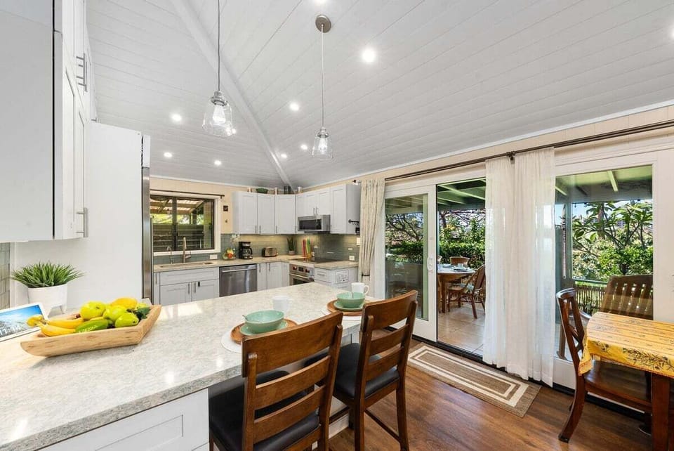 Enjoy natural light, spacious counters, and a cozy breakfast bar—perfect for relaxed island living