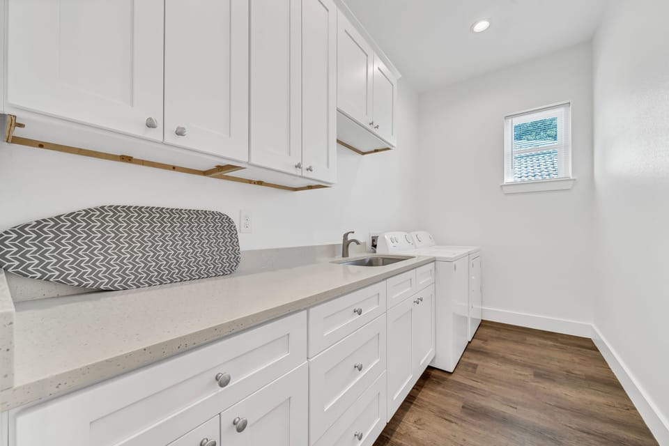 1st Floor Large Laundry Space with Iron, Ironing Board and Mud Sink!