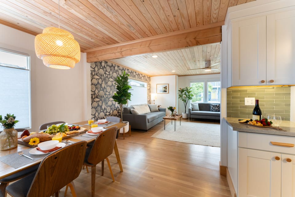 Living room opens to the dining area and kitchen.