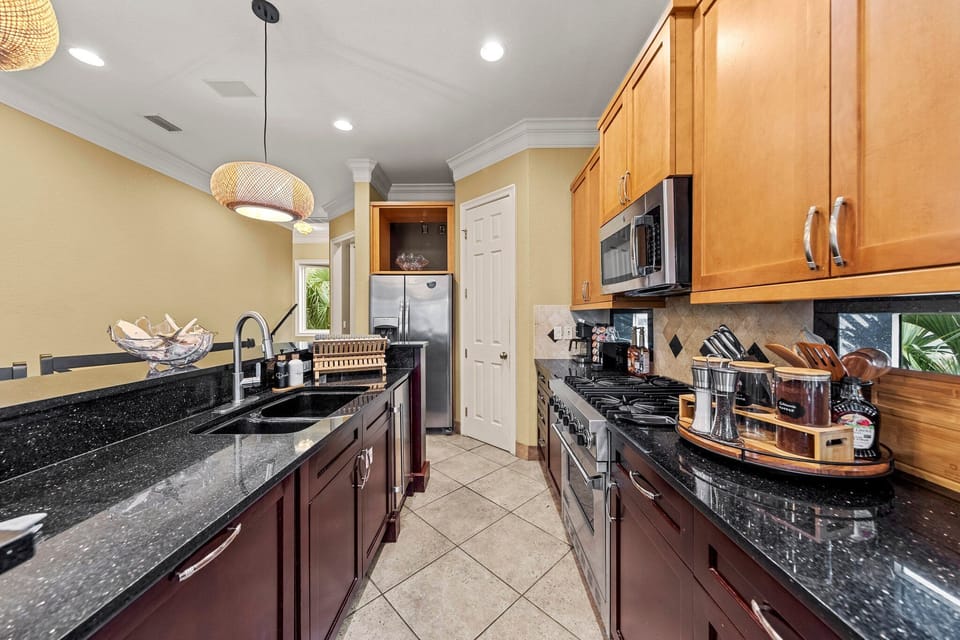 Culinary Delight: Whip up gourmet flavors in this spacious, modern kitchen, crafted for the epicurean adventurer and ideal for family gatherings. 🍳✨ Enjoy cooking in style!