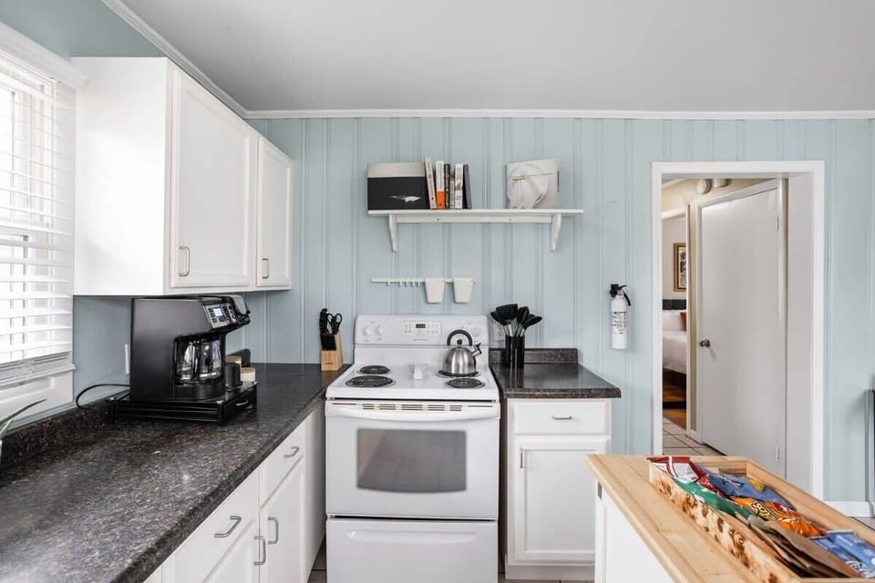 Discover culinary bliss with modern appliances and sleek, stylish finishes!