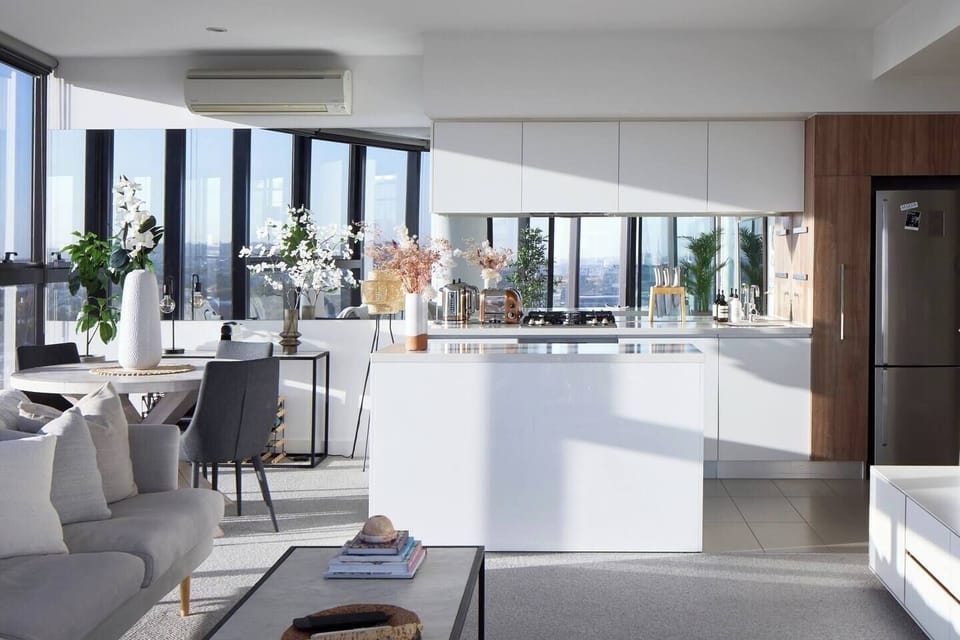 The kitchen seamlessly integrates with the open-plan dining area, creating an easy social cohesion. 
