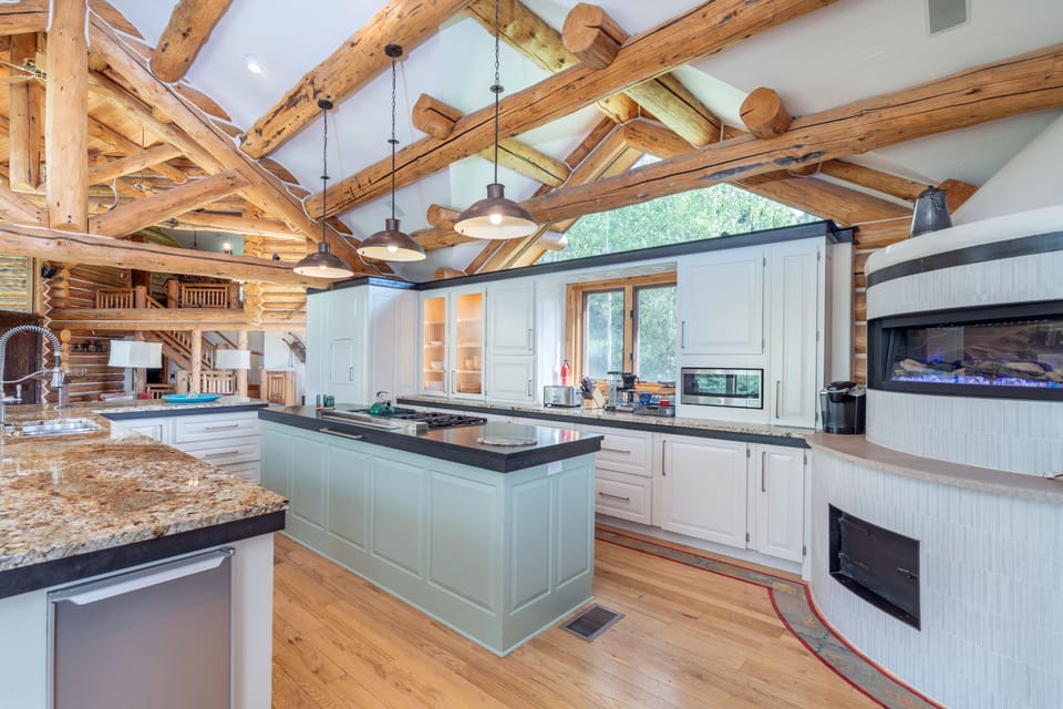 Kitchen - Fully equipped kitchen featuring a custom dumbwaiter