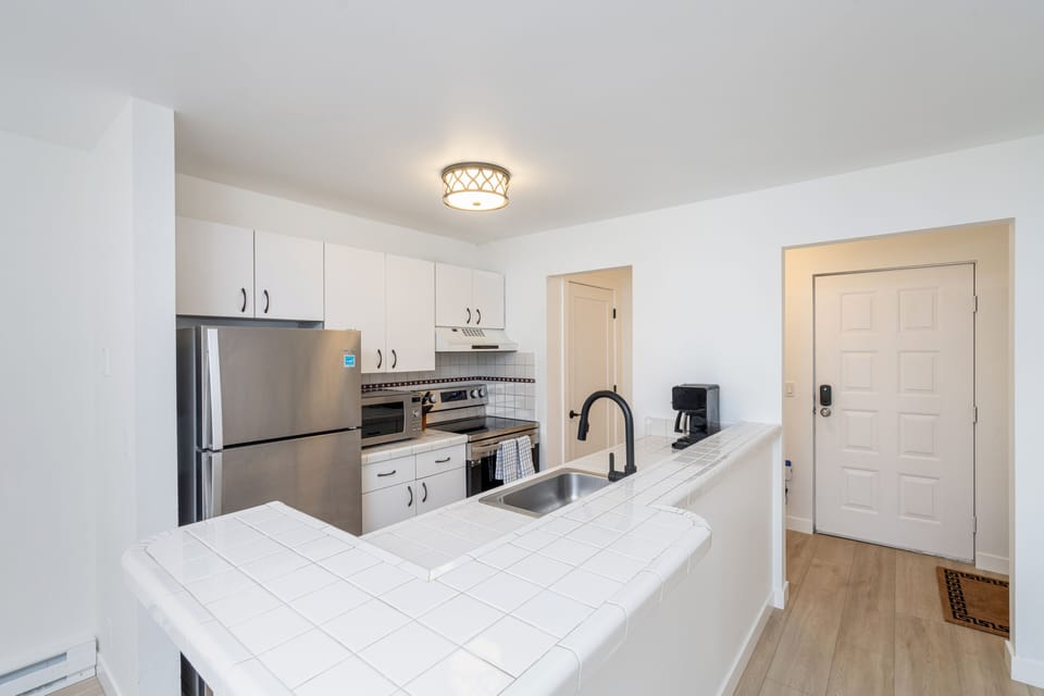 Kitchen - Fully appointed with stainless steel appliances