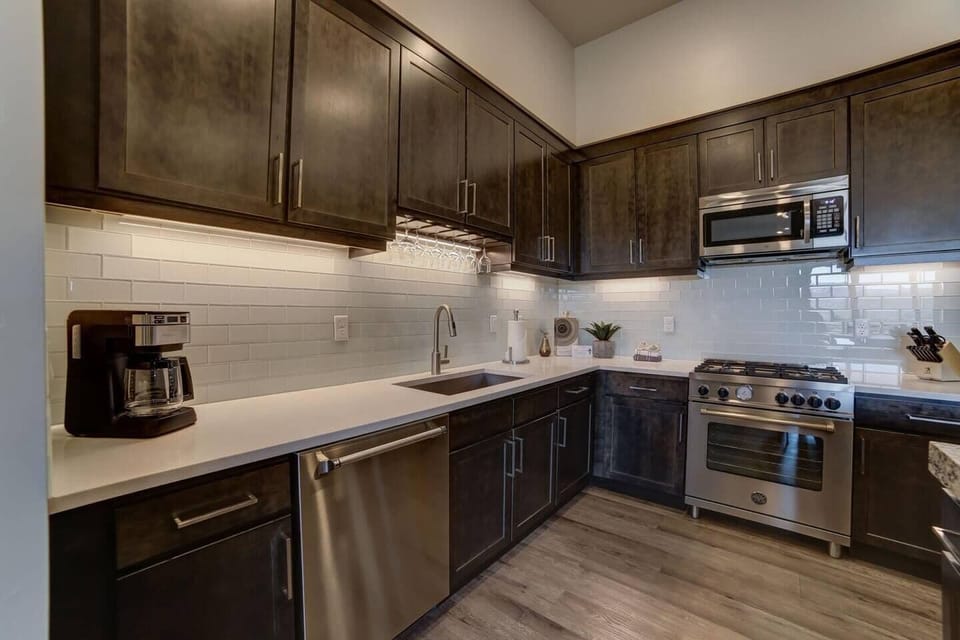 Modern luxurious kitchen with island bar and deluxe appliances