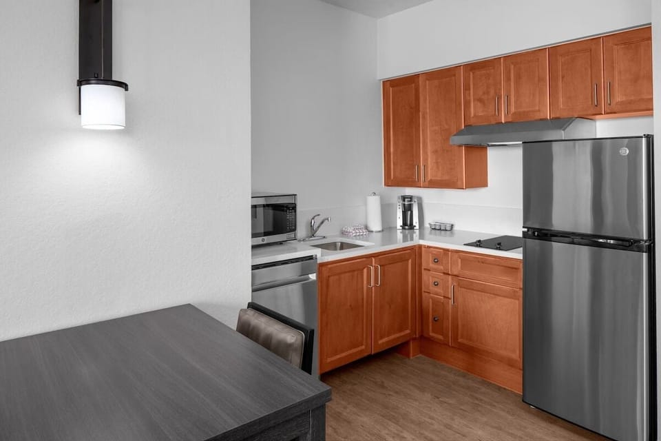 Cook with ease in the full kitchen with sleek appliances.