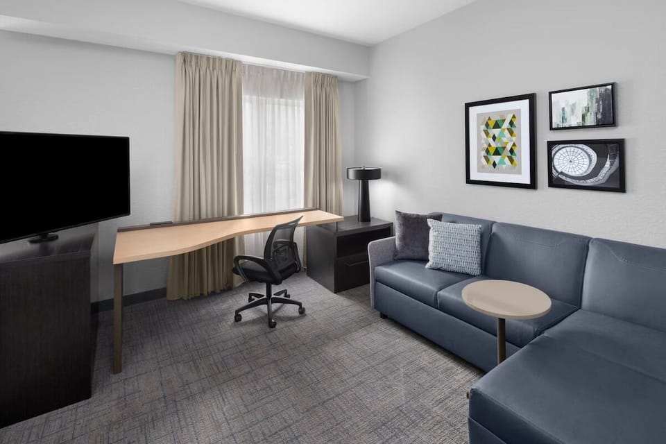 Settle in with a comfy sofa and productive workspace nook.