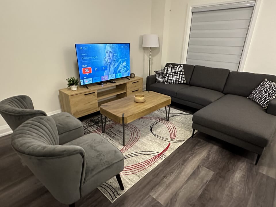TV, cozy sofa, two chars - sufficient for 6-8 people. TV has 1000's of movies