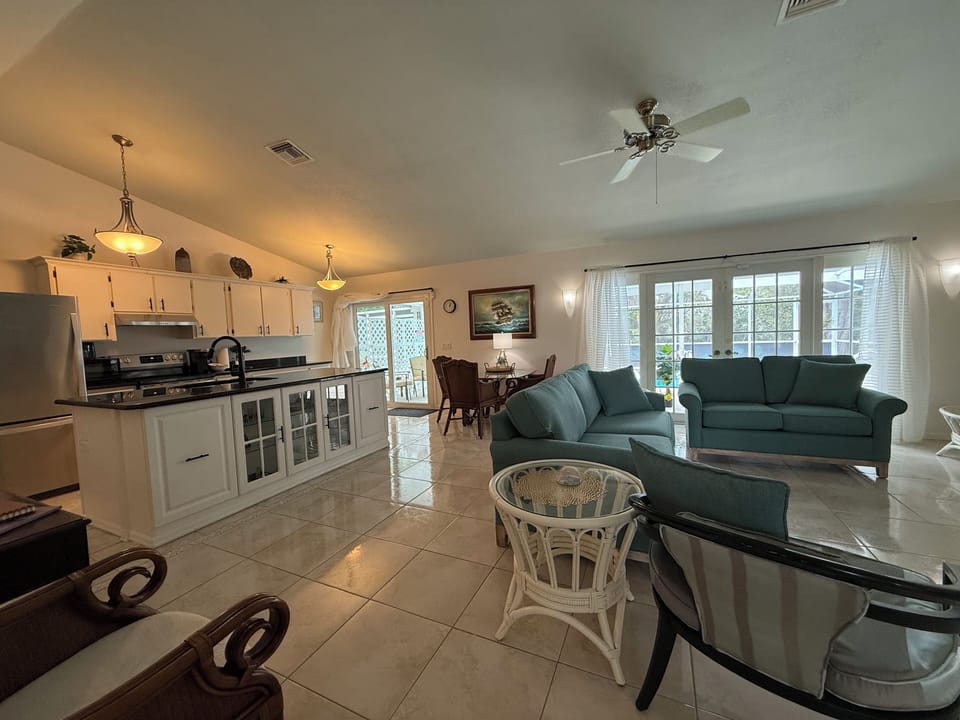 Kitchen, living area.  Dining table with seating for 4.  Outdoor dining for 6. 