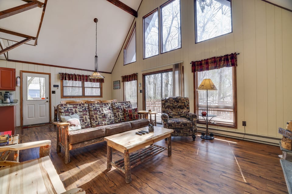 A cozy living room nestled in woodsy charm.