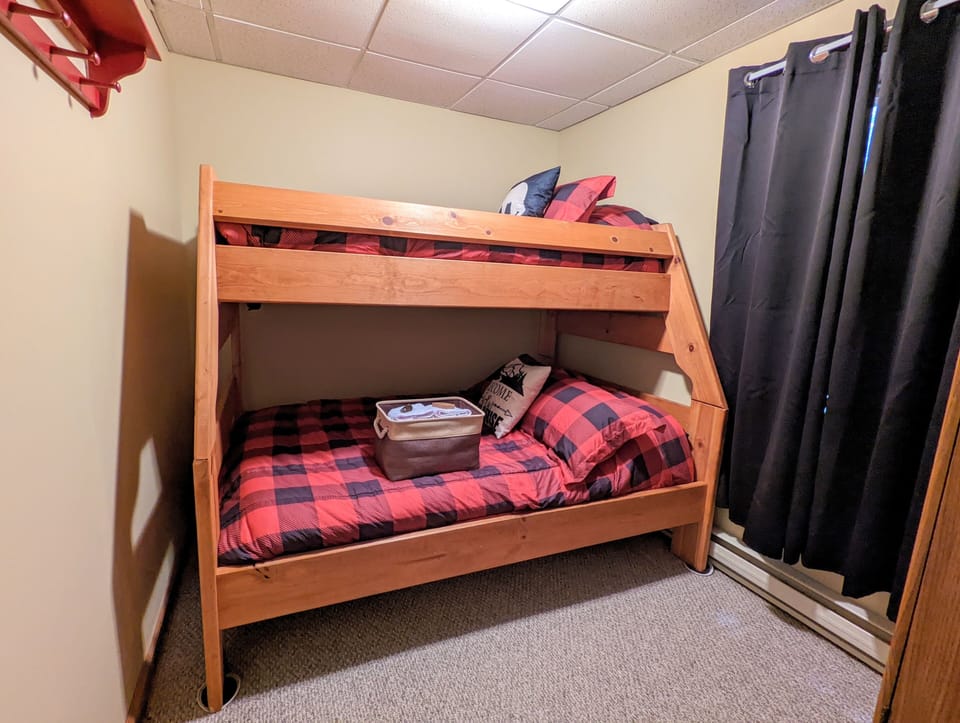 Bedroom 3 features a full over twin bunk bed.