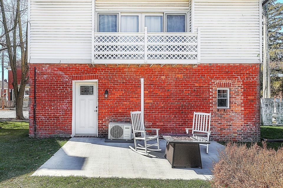 Exterior, back door, balcony and patio with gas fire pit