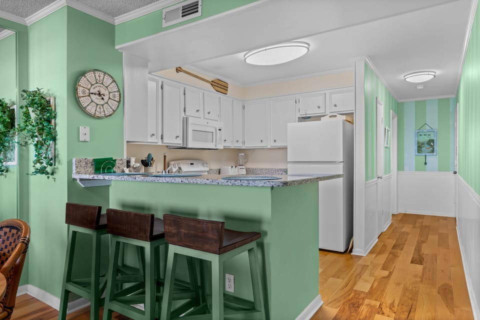 Bar seating and kitchen 