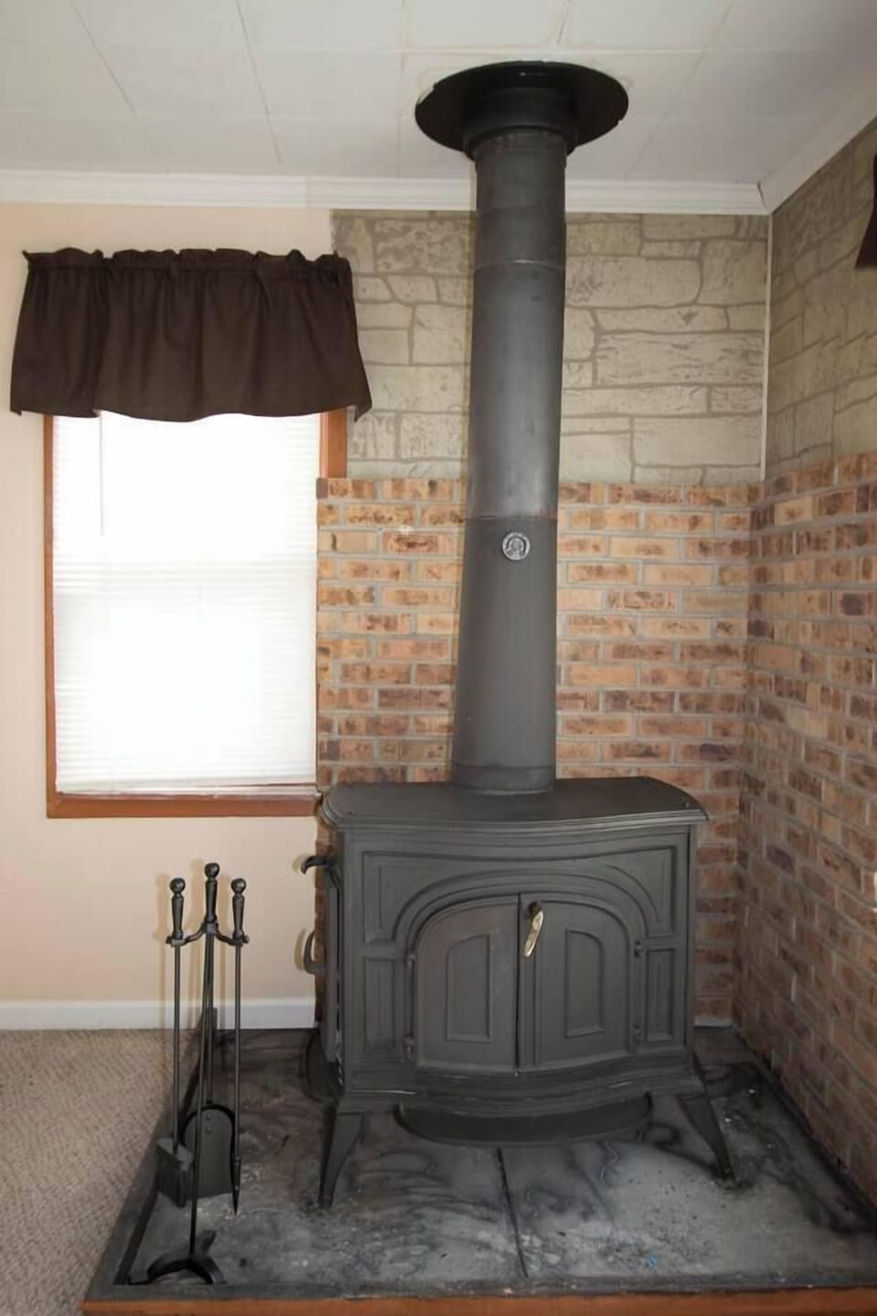Wood fireplace adds to the up North feel!