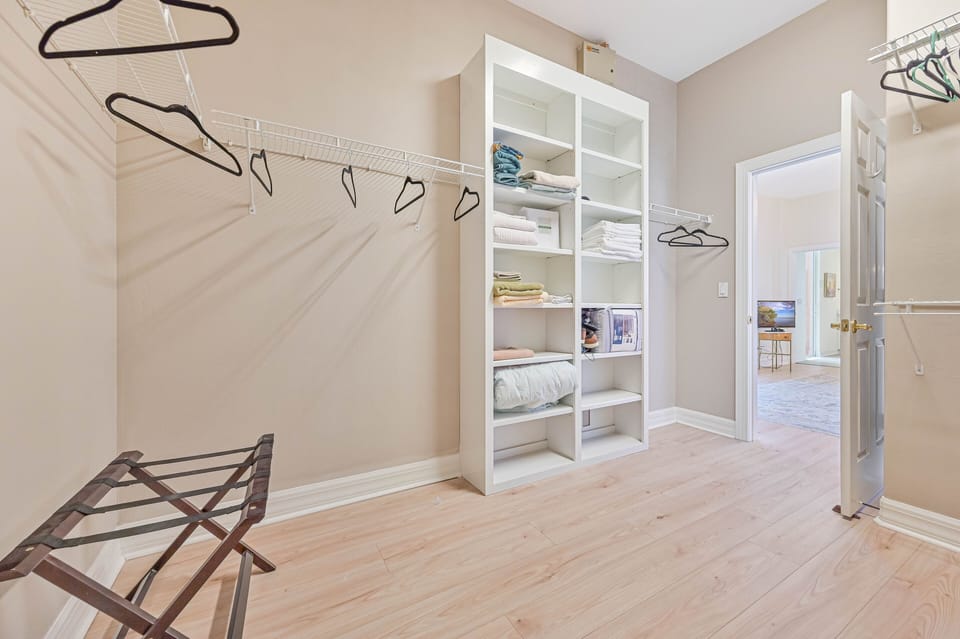 Bonita Bliss - An oversized closet in the primary suite