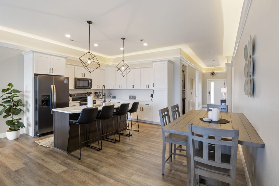 The spacious kitchen and dining area creates a perfect connecting place for meals and game nights