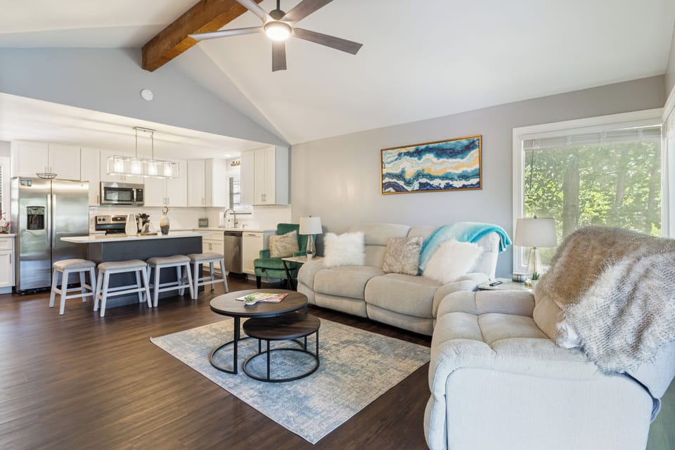 Open space from the living area to the dining and kitchen.