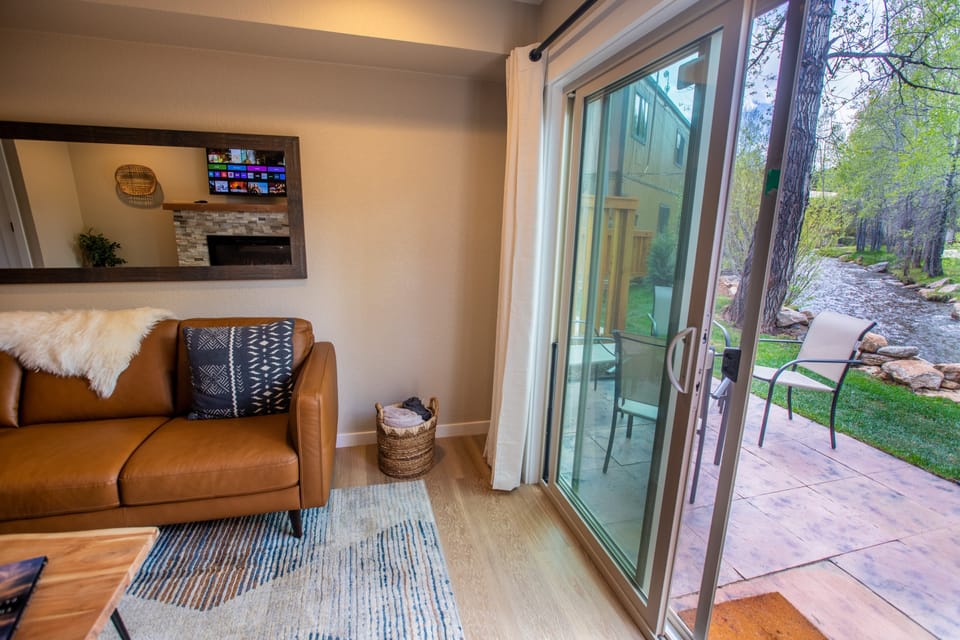 Livingroom that leads to patio riverside.jpg
