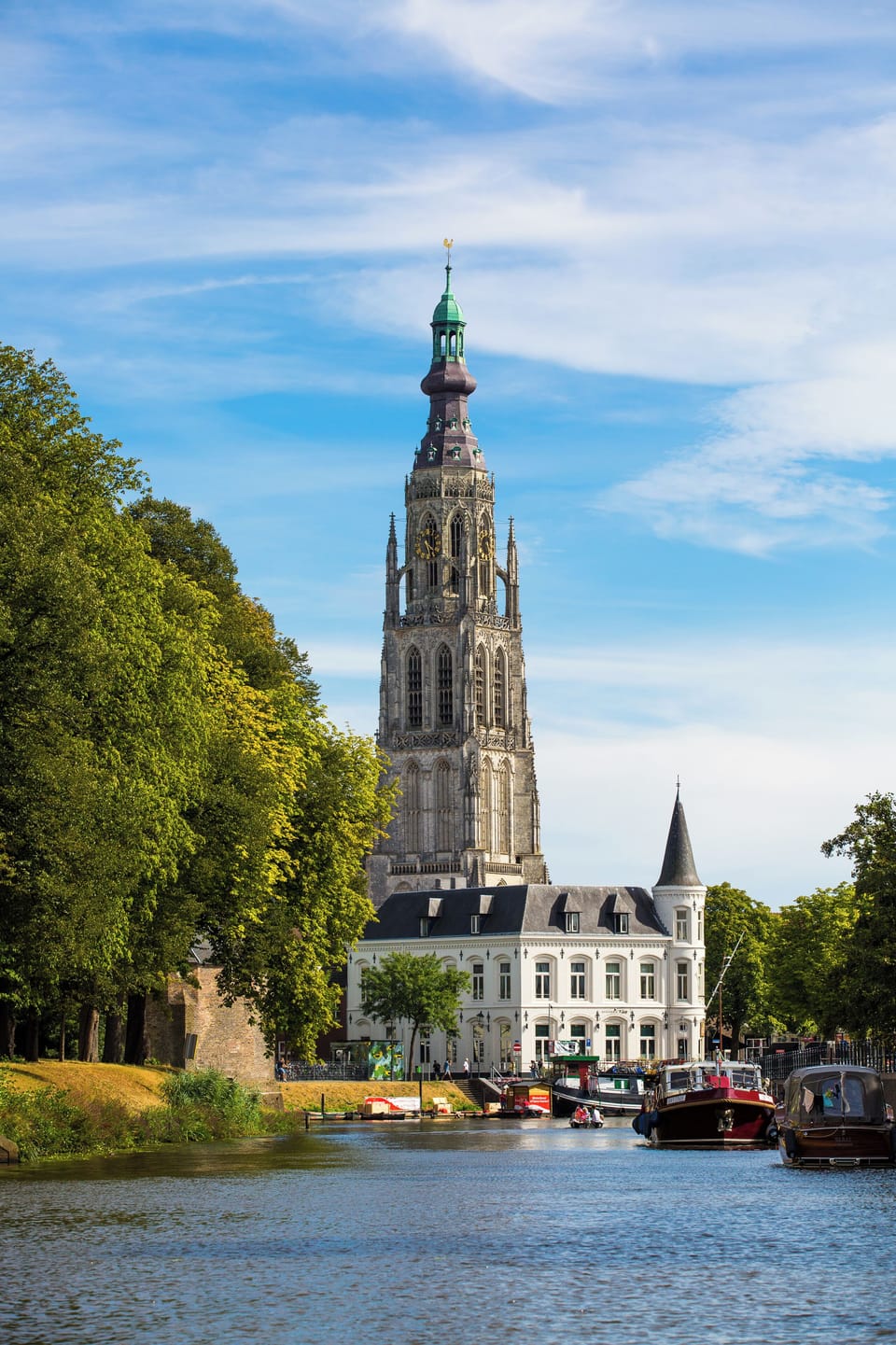 Visit Breda, a lovely city in Brabant, featuring peaceful canals and the iconic Grote Kerk, a blend of history and beauty.