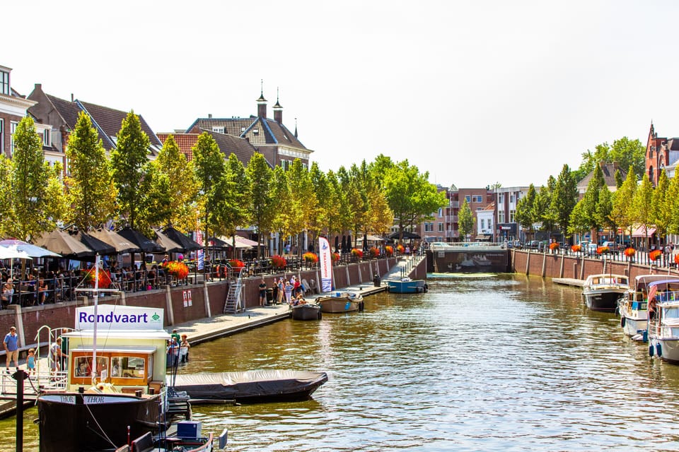 Visit Breda, a charming Brabant destination with sunny canal-side walks and cozy spots to enjoy local food.