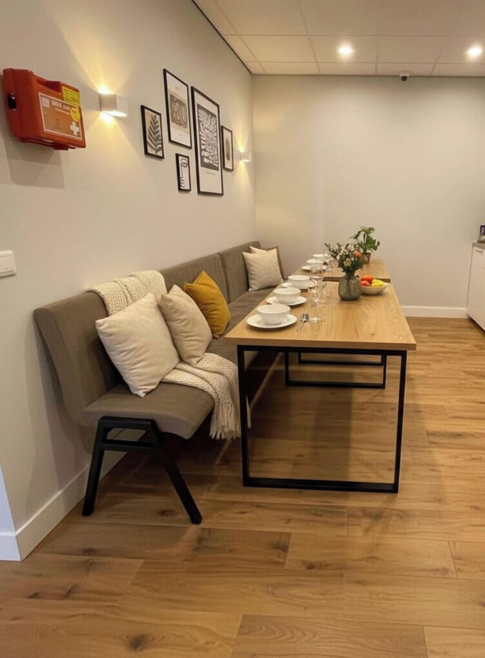 Spacious shared kitchen with induction stoves and large dining table – cook and dine in comfort.