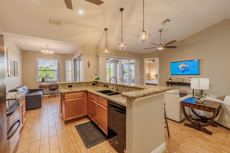 Culinary Delight - - Kitchen flows effortlessly into the living space, making it ideal for entertaining
- Pendant lighting and thoughtful details elevate this functional and stylish area
- Perfect for hosting or enjoying quiet mornings with coffee