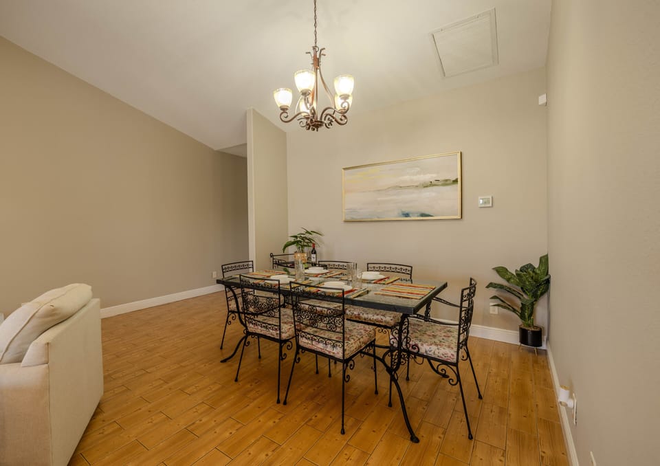 Chic Dinning Space - - Share unforgettable meals in this chic dining space, where every detail sets the mood
- Stylish chandelier and modern decor make every meal feel special
- Gather, laugh, and indulge in a space designed for connection and comfort