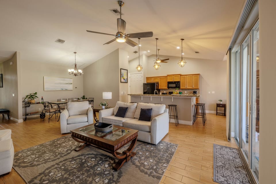 Open Comfort - - Enjoy the open concept layout that seamlessly connects the living, dining, and kitchen areas
- Stylish furnishings and warm wood floors add an elegant touch to the space
- Ideal for entertaining or simply enjoying quality family time