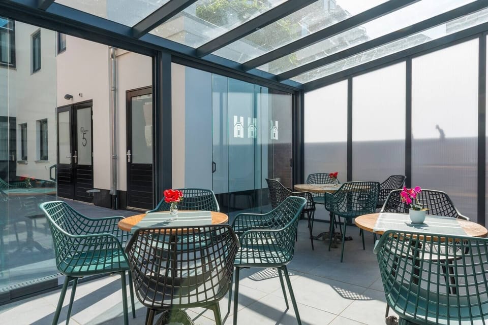 Feel at home in our stylishly furnished seating area.
