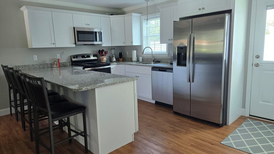 Full Size refrigerator and dishwasher. All the modern conveniences.