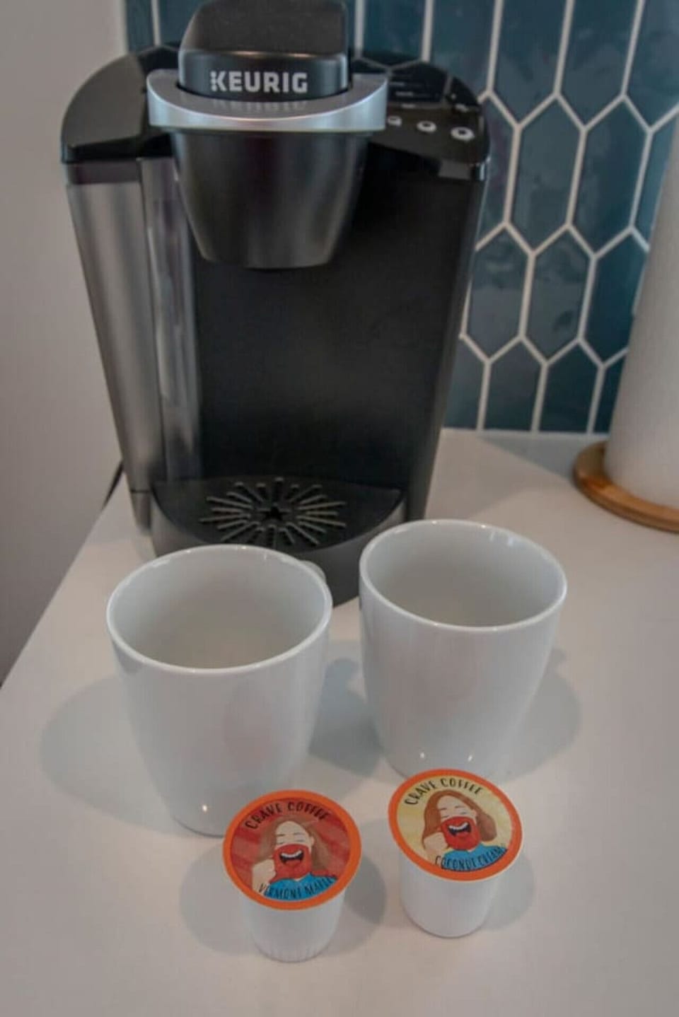 A coffee maker with cups ready to go means your mornings start without any effort.