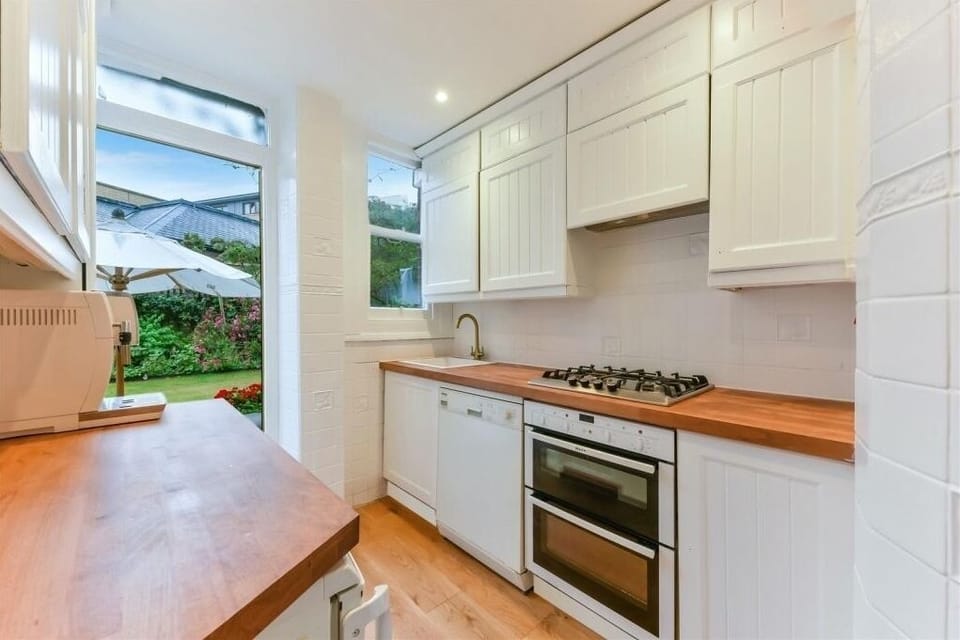 Kitchen with direct access to private communal garden