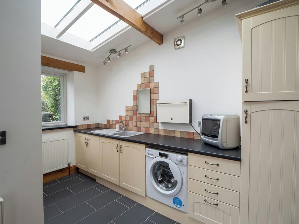 Washing machine, sink, and draws and cupboards